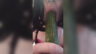 Sissy Cindy has fun with cucumber