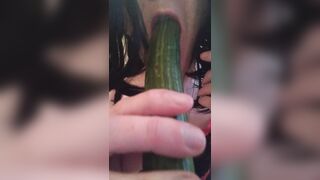 Sissy Cindy has fun with cucumber