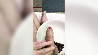 uncut playing with coffee beans in my uncut dick for a guy in Italy