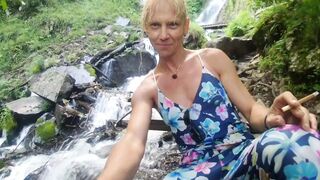 Alexa Cosmic swimming in beautiful waterfall wearing colorful combi dress...