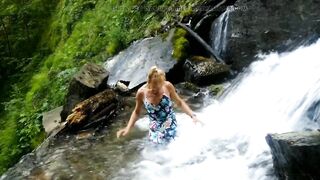 Alexa Cosmic swimming in beautiful waterfall wearing colorful combi dress...