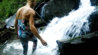 Alexa Cosmic swimming in beautiful waterfall wearing colorful combi dress...