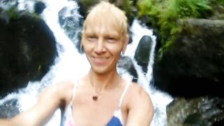 Alexa Cosmic swimming in beautiful waterfall wearing colorful combi dress...