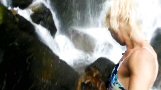 Alexa Cosmic swimming in beautiful waterfall wearing colorful combi dress...