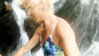 Alexa Cosmic swimming in beautiful waterfall wearing colorful combi dress...