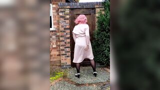 Sexy crossdresser in satin dress