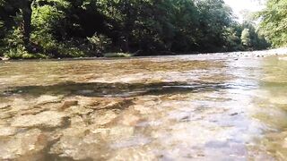 Sexy t-girl swimming in mountain river and wetting teal summer dress ...