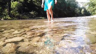 Sexy t-girl swimming in mountain river and wetting teal summer dress ...