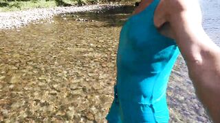 Sexy t-girl swimming in mountain river and wetting teal summer dress ...