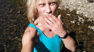 Sexy t-girl swimming in mountain river and wetting teal summer dress ...