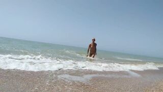 Alexa Cosmic shemale naked on the beach getting messy with sand and swimming in the sea...