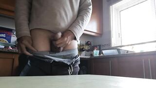 Jerking off session in the kitchen and shooting my cum over the kitchen table