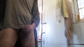 Smooth daddy pissing with a half-erected dick and jerking off straight after with cumshot