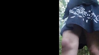 Femboy goes panty-less in public forest! Shemale cock and ass stick out from dress