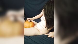 Tran's girl with fangs fucks pumpkin in thigh highs