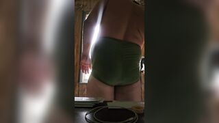 Doing stuff around the was will a huge plug deep in ass wearing a thong and shorts