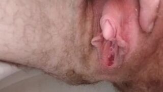 Pissing with a close up view of pussy and clit