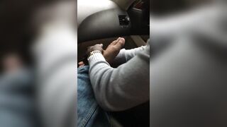 Smelly foot rub and toe play at the parking lot