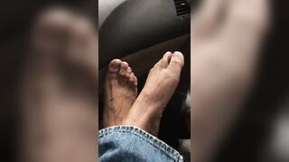 Smelly foot rub and toe play at the parking lot