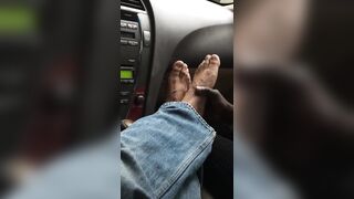 Smelly foot rub and toe play at the parking lot