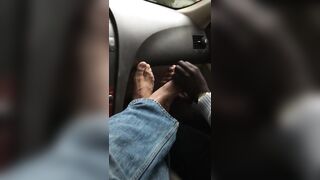 Smelly foot rub and toe play at the parking lot