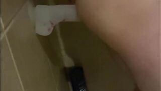 Riding my dildo in the shower then cumming on it