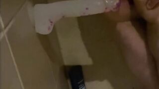 Riding my dildo in the shower then cumming on it