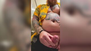 Bearded Tattooed Daddy jerks off in public restroom