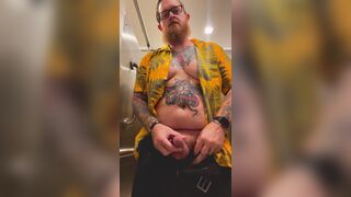 Bearded Tattooed Daddy jerks off in public restroom