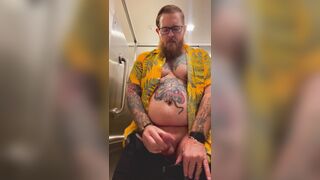 Bearded Tattooed Daddy jerks off in public restroom