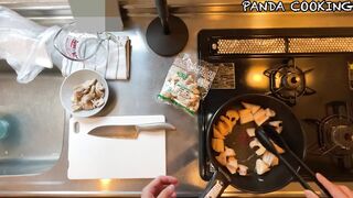 A man wearing pants makes stir-fried lotus root and pork