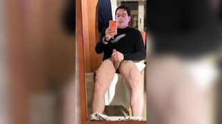 Jerking off my hard dick in the mirror at the hotel.