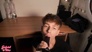 Twink has fun with a dildo in his ass