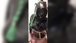 Masturbation with gas mask and black latex