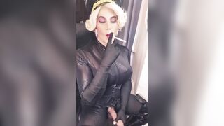 Blonde trans with big cock smokes a long cigarette and strokes for you