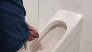 Risky urinal wank and cum