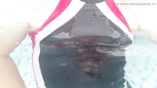 Sissy wearing one piece swimsuit and tights and swimming in pool