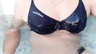 Femboy in sexy Adidas bikini swimming in pool
