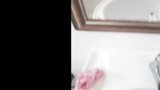 alternative trans cumming in front of the mirror