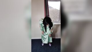 Tv crossdresser in green satin dress