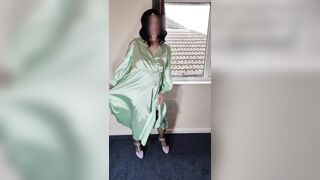 Tv crossdresser in green satin dress