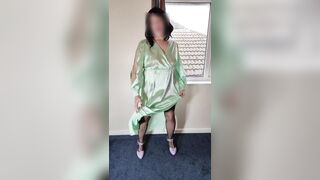 Tv crossdresser in green satin dress