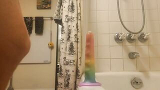 Femboys cums riding rainbow dildo