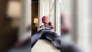exhibitionist spiderman cums from hotel window ????