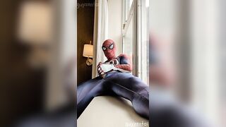 exhibitionist spiderman cums from hotel window ????
