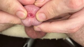 Close-up urethra, foreskin play, and jerking off to a creamy cumshot