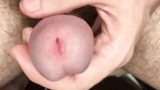 Close-up urethra, foreskin play, and jerking off to a creamy cumshot