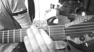 cute enby fingers a guitar into submission