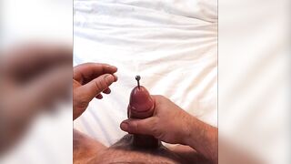 Extreme urethral sounding + cum. Hard oiled cock. After cum I push with every drop back in cock with a sound.