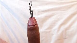 Extreme urethral sounding + cum. Hard oiled cock. After cum I push with every drop back in cock with a sound.